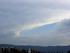 A weaker storm near Picton sends out a large anvil