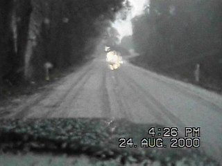 Hail over the road near the town of Hill Top.