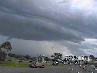 The storm begins to develop a shelf cloud.